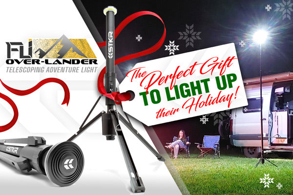 FLi OVER-LANDER perfect gift home page banner. "The Perfect Gift TO LIGHT UP their Holiday" Image of product on left, lifestyle on right featuring a conversion van camping scene.